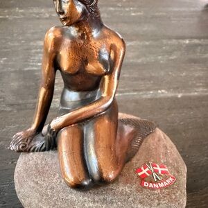 Bronze-Kneeling Mermaid Figurine with Denmark Badge on a stone .collectible art